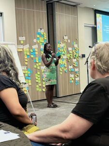 Proscovia Alando speaking at the S-PoL event on sustainable aquatic food systems in Cape Town, 2024